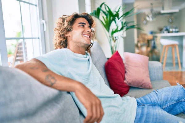 Young Hispanic Man Smiling Happy Sitting Sofa Home — Stock Photo, Image