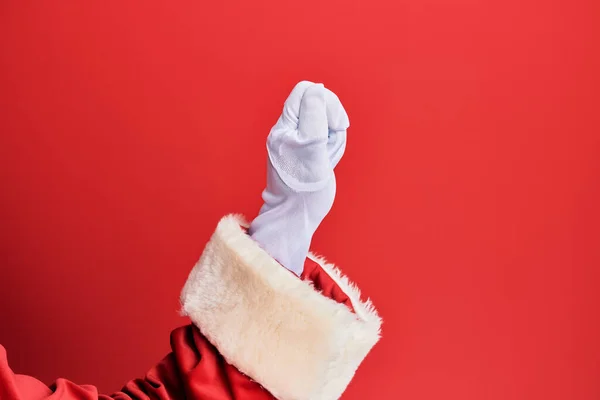 Mão Homem Vestindo Traje Papai Noel Luvas Sobre Fundo Vermelho — Fotografia de Stock