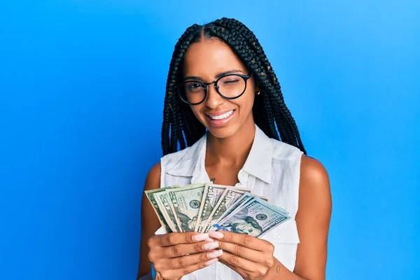 Beautiful Hispanic Woman Holding Dollars Winking Looking Camera Sexy Expression — Stock fotografie