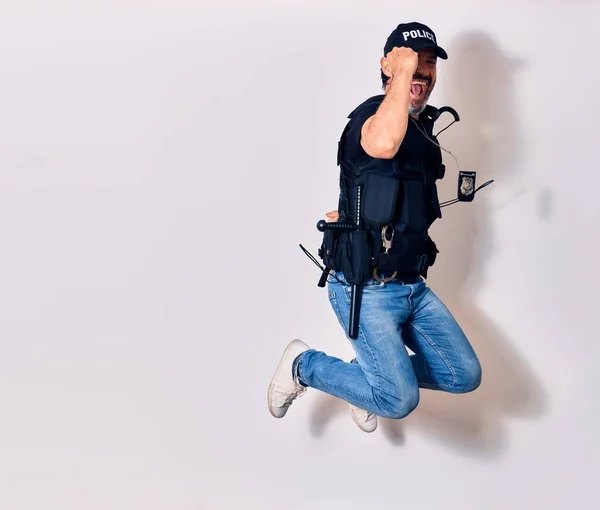 Hombre Guapo Mediana Edad Vistiendo Uniforme Policía Sonriendo Feliz Saltar —  Fotos de Stock