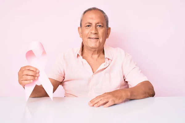 Senior Handsome Man Gray Hair Holding Pink Cancer Ribbon Sitting — Stock Photo, Image