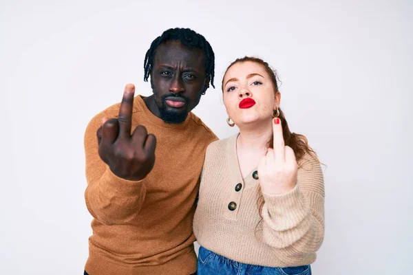 Interracial Couple Wearing Casual Clothes Showing Middle Finger Impolite Rude — 图库照片