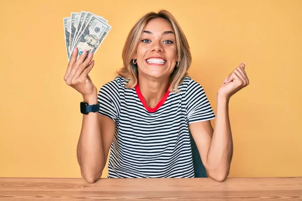 Beautiful Caucasian Woman Holding Dollars Banknotes Screaming Proud Celebrating Victory — Stock Photo, Image