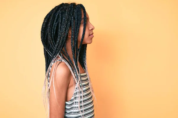 Young African American Girl Child Braids Yellow Background Looking Side — Stock fotografie