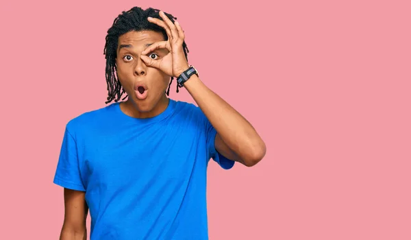 Young African American Man Wearing Casual Clothes Doing Gesture Shocked — Stock Photo, Image