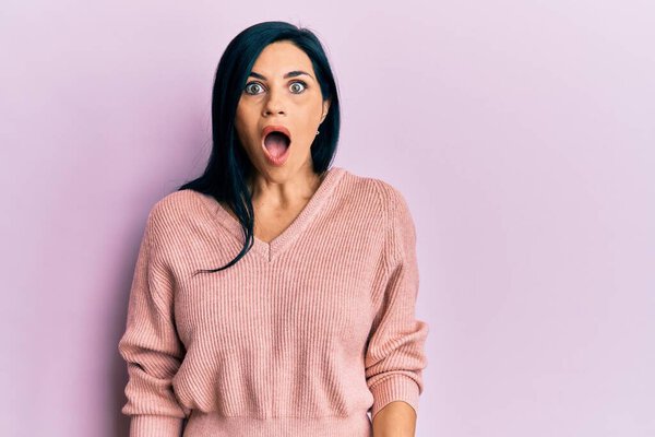 Young caucasian woman wearing casual clothes afraid and shocked with surprise and amazed expression, fear and excited face. 