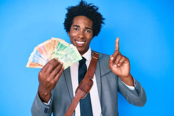 Handsome African American Man Afro Hair Holding South African Rand —  Fotos de Stock