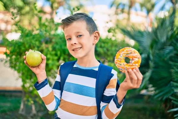 Adorable Caucasian Student Boy Smiling Happy Holding Donut Bottle Water — Stock Photo, Image