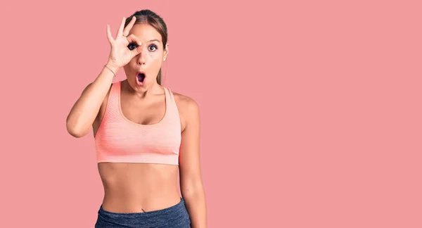 Young Beautiful Hispanic Woman Wearing Sportswear Doing Gesture Shocked Surprised — Stock Photo, Image