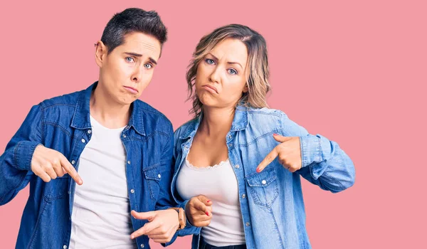 Couple Women Wearing Casual Clothes Pointing Looking Sad Upset Indicating — Stock Photo, Image