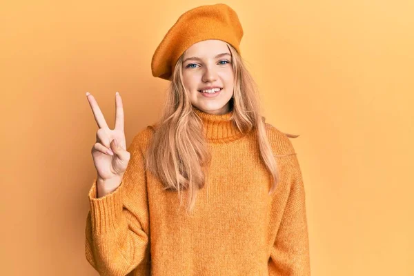 Beautiful Young Caucasian Girl Wearing French Look Beret Showing Pointing — Stock Photo, Image