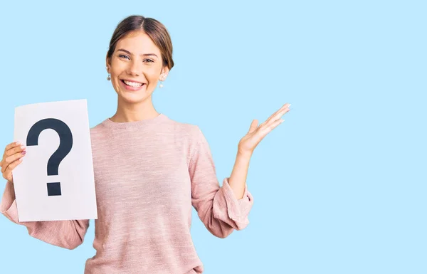 Beautiful Caucasian Woman Blonde Hair Holding Question Mark Celebrating Victory — Stock Photo, Image