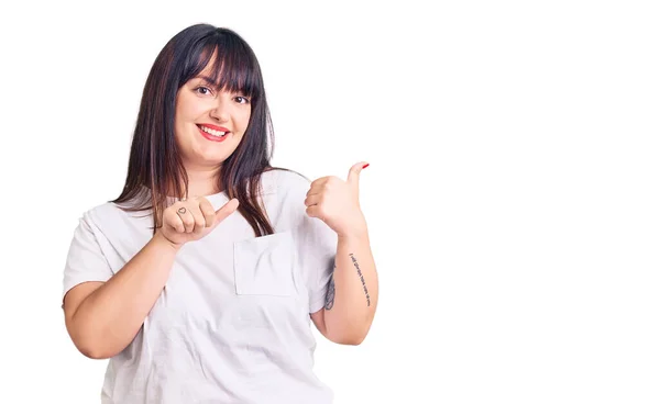 Young Size Woman Wearing Casual Clothes Pointing Back Hand Thumbs — Stock Photo, Image