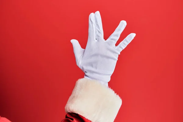 Χέρι Ενός Άνδρα Που Φοράει Κοστούμι Santa Claus Και Γάντια — Φωτογραφία Αρχείου