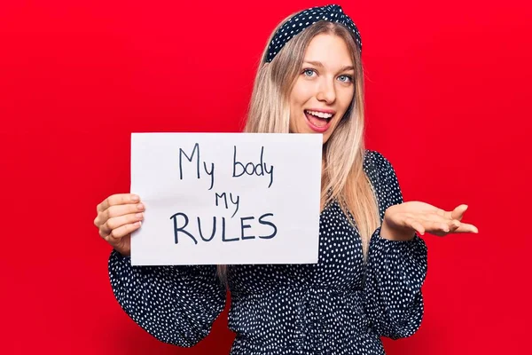 Young Blonde Woman Holding Body Rules Banner Celebrating Achievement Happy — Stock Photo, Image