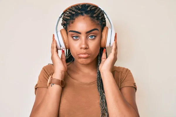 Young African American Woman Braids Listening Music Using Headphones Depressed — Stock Photo, Image