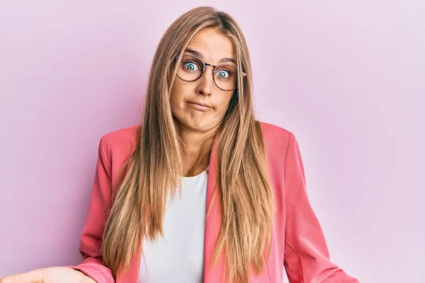 Young Blonde Woman Wearing Business Style Glasses Clueless Confused Expression — 图库照片