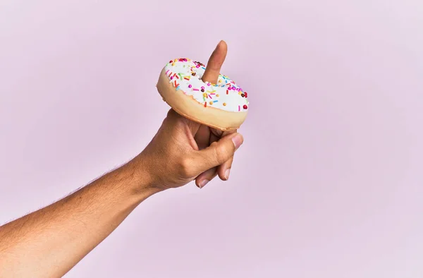Finger Hispanic Man Holding Donut Isolated Pink Background — Stock Photo, Image