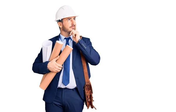 Young Hispanic Man Wearing Architect Hardhat Leather Bag Holding Blueprints — Stock Photo, Image