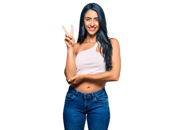 Beautiful Hispanic Woman Wearing Casual Clothes Smiling Happy Face Winking — Stock Photo, Image