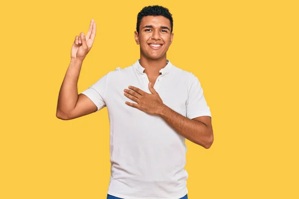 Young Arab Man Wearing Casual Clothes Smiling Swearing Hand Chest — Stock Photo, Image