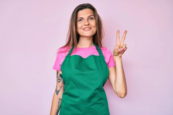 Beautiful Caucasian Woman Wearing Professional Apron Smiling Happy Face Winking — Stock Photo, Image