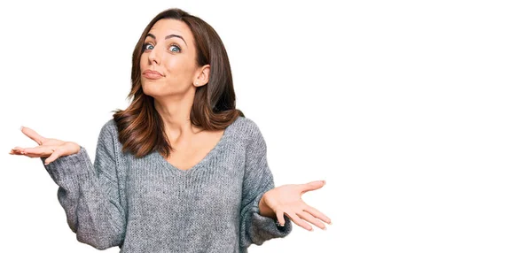 Young Brunette Woman Wearing Casual Winter Sweater Clueless Confused Expression — Stock Photo, Image