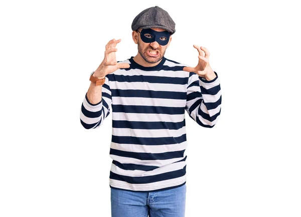 Young Handsome Man Wearing Burglar Mask Shouting Frustrated Rage Hands — Stock Photo, Image