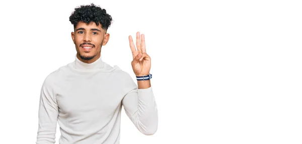 Young Arab Man Wearing Casual Winter Sweater Showing Pointing Fingers — Stock Photo, Image