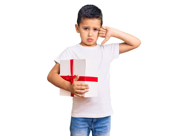 Little Cute Boy Kid Holding Gift Angry Face Negative Sign — Stockfoto