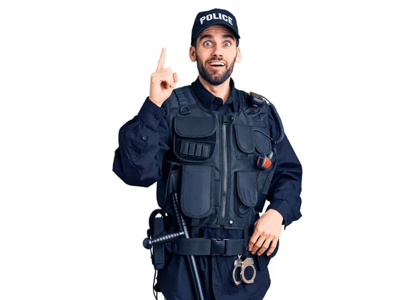 Молодой Красавчик Бородой Полицейской Форме Указывает Пальцем Успешную Идею Взволнован — стоковое фото