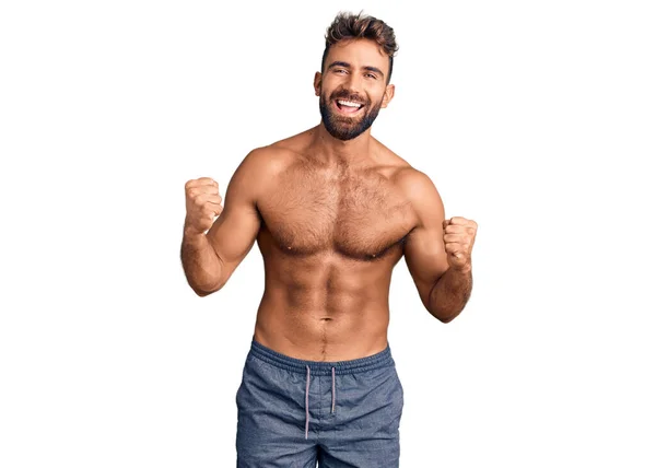 Young Hispanic Man Wearing Swimwear Shirtless Celebrating Surprised Amazed Success — Stock Photo, Image
