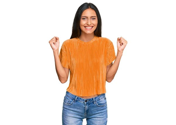 Young Brunette Arab Woman Wearing Casual Clothes Celebrating Surprised Amazed — Stock Photo, Image