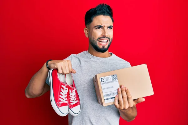 Young Man Beard Taking Casual Red Shoes Box Angry Mad — Stockfoto