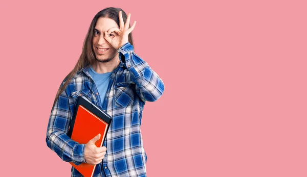 Young Adult Man Long Hair Holding Collage Book Smiling Happy — Stock Photo, Image