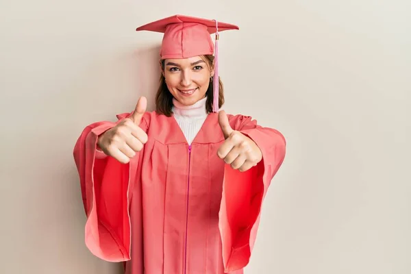 Young Caucasian Woman Wearing Graduation Cap Ceremony Robe Approving Doing — Foto Stock