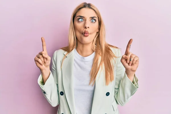 Young Caucasian Woman Wearing Business Clothes Pointing Fingers Making Fish — Stock Photo, Image