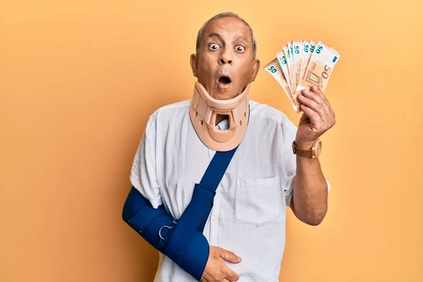 Handsome Mature Injured Man Wearing Cervical Collar Sling Holding Insurance — Stock Photo, Image