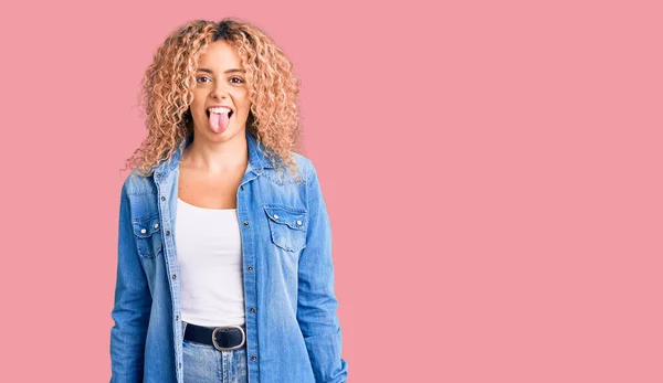 Young Blonde Woman Curly Hair Wearing Casual Denim Jacket Sticking — Stock Photo, Image