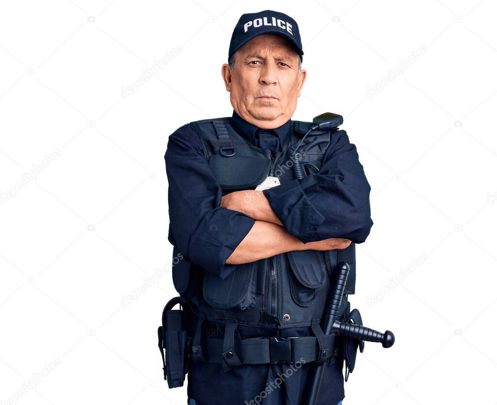 Senior handsome man wearing police uniform skeptic and nervous, disapproving expression on face with crossed arms. negative person. 