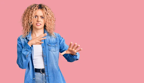 Young Blonde Woman Curly Hair Wearing Casual Denim Jacket Disgusted — Stock Photo, Image