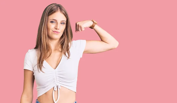 Young Beautiful Blonde Woman Wearing Casual White Tshirt Strong Person — Stock Photo, Image