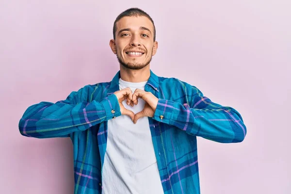 Hispanic Young Man Wearing Casual Clothes Smiling Love Showing Heart — Stock Photo, Image