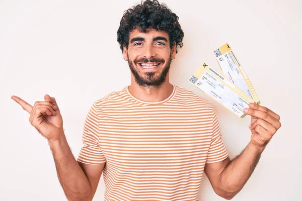 Handsome Young Man Curly Hair Bear Holding Boarding Pass Smiling — Stock Photo, Image
