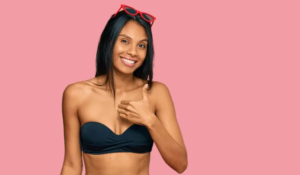 Young African American Woman Wearing Bikini Doing Happy Thumbs Gesture — Stock Photo, Image