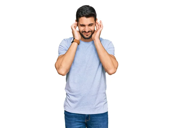 Young Hispanic Man Wearing Casual Clothes Covering Ears Fingers Annoyed — Stock Photo, Image