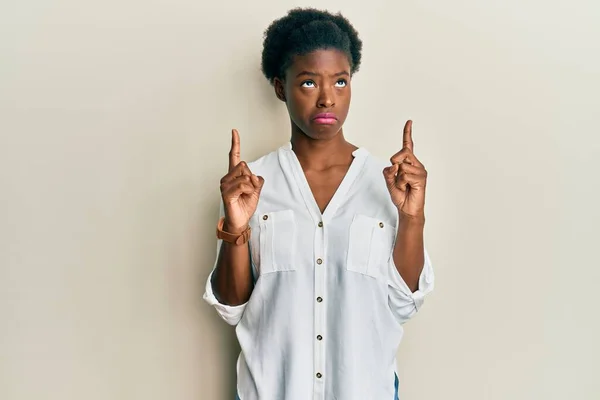 Young African American Girl Wearing Casual Clothes Pointing Looking Sad — Stock Photo, Image