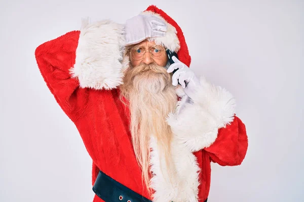 Old Senior Man Wearing Santa Claus Costume Speaking Phone Stressed — Stock Photo, Image