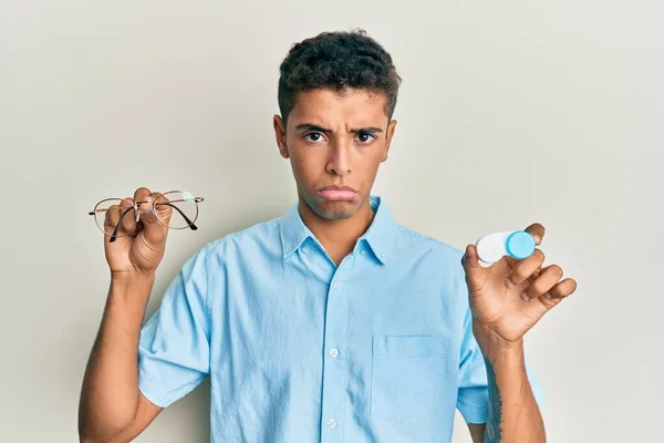 Young Handsome African American Man Holding Glasses Contact Lenses Depressed — Stock Photo, Image