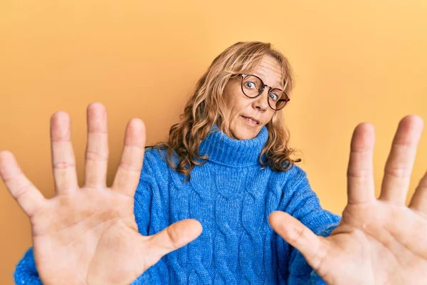 Middle Age Blonde Woman Wearing Glasses Casual Winter Sweater Afraid — Stock Photo, Image